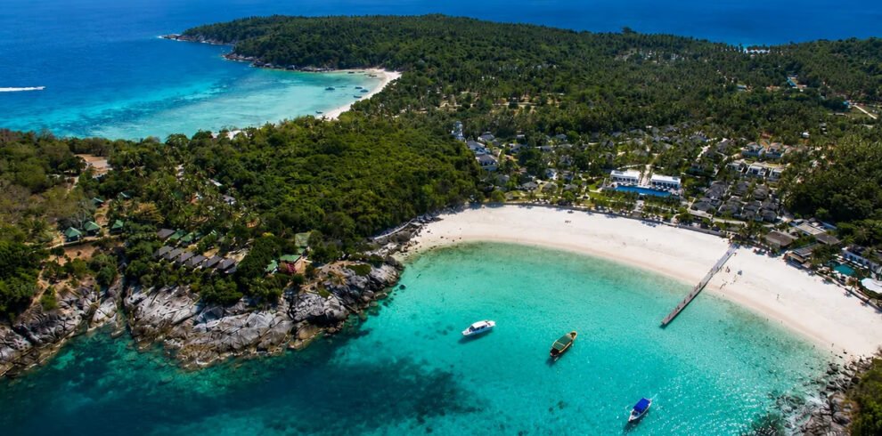 “Aerial view of tropical beach and turquoise water at Racha Island near Phuket Thailand”